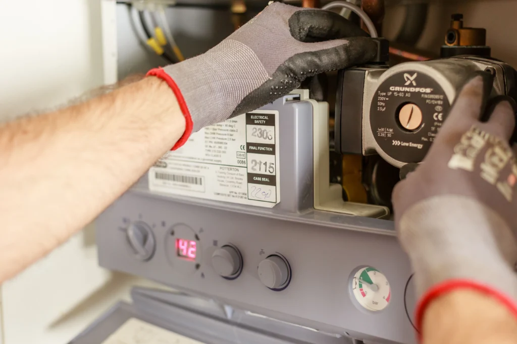 Picture of a technician repairing a unit