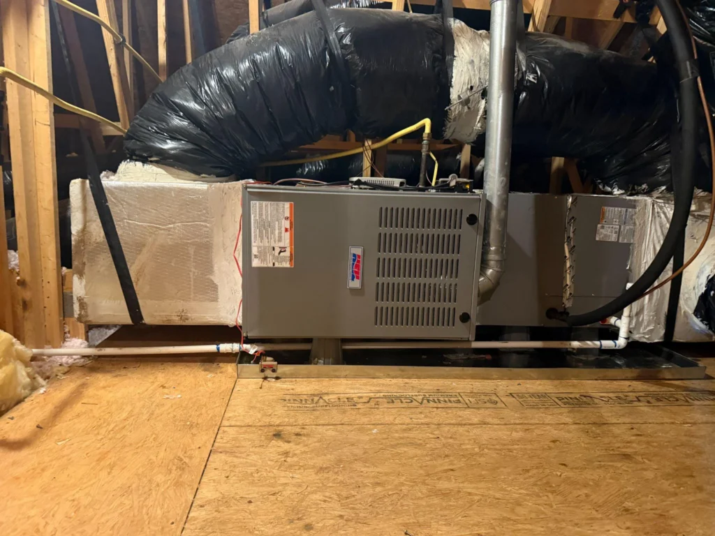 Picture of an indoor air handler unit in an attic
