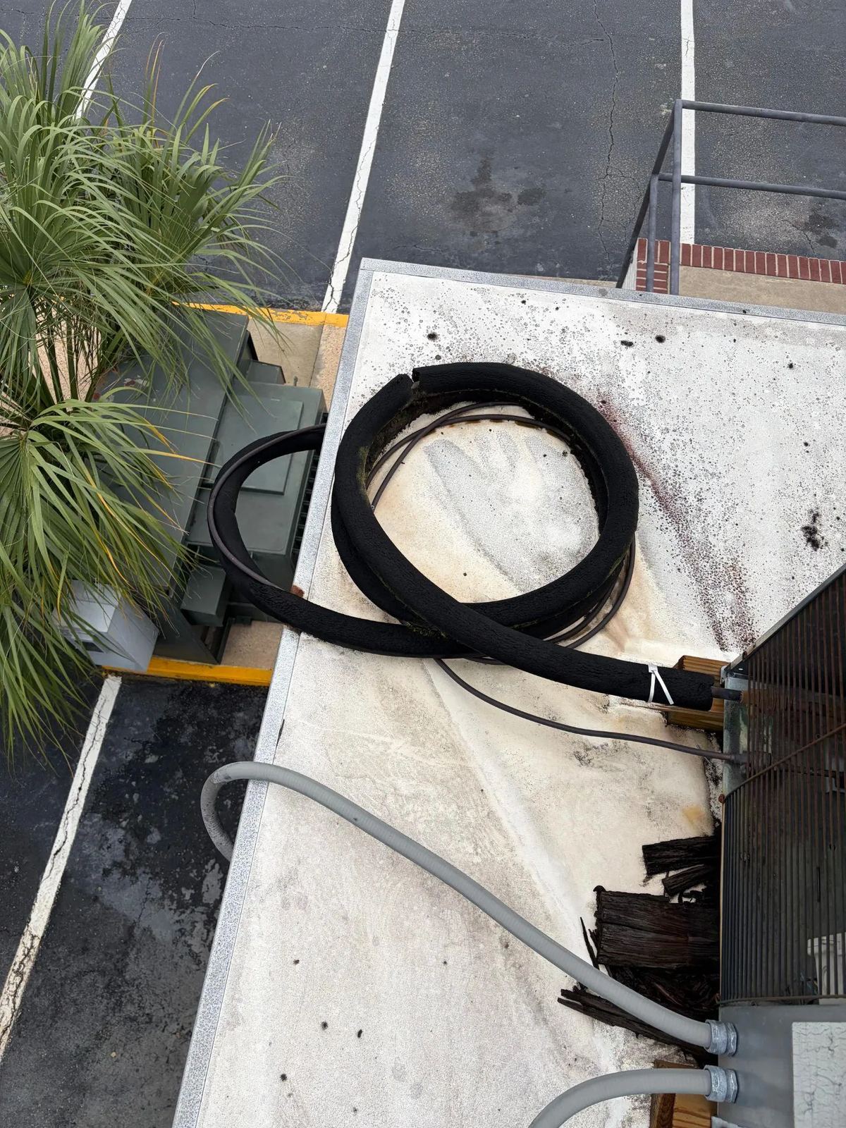 Picture of insulated refrigerant piping on a commercial rooftop
